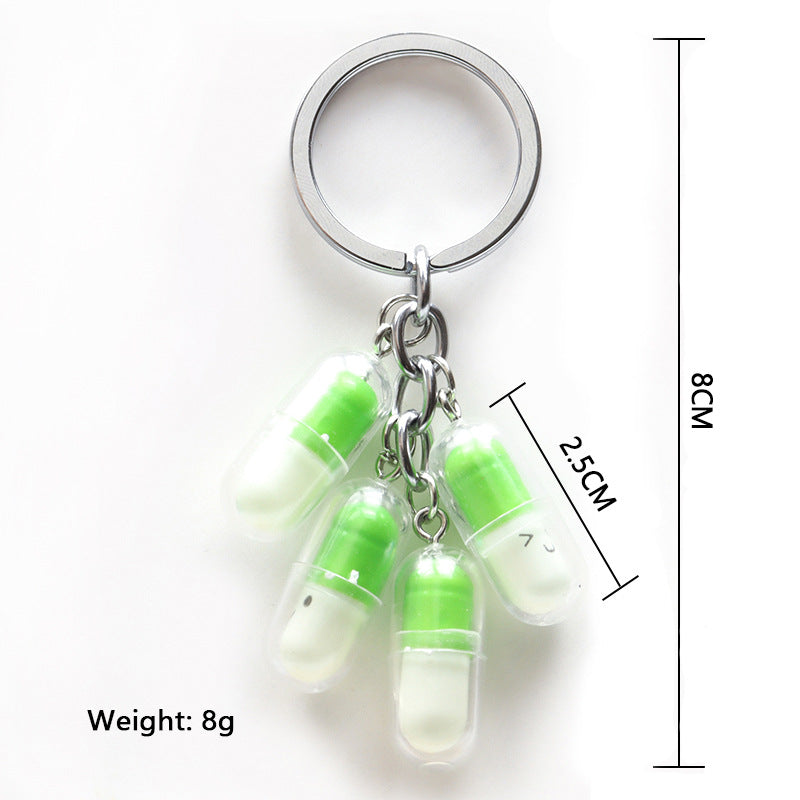 Wholesale Acrylic Cute Smiley Face Capsule Pendant Keychain
